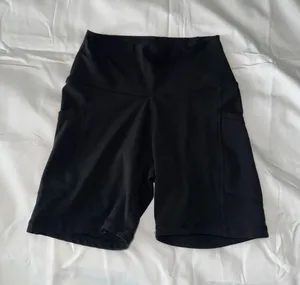 Black Solid Biker Shorts With Pocket Detail thumbnail 1