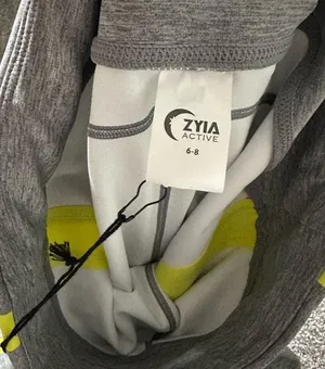 Zyia leggings new with tags! Size 6-8 gray and neon yellow thumbnail 2