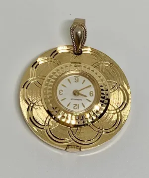Vintage Caravelle by Bulova women Mechanical Pendant Watch gold tone 33mm works thumbnail 1