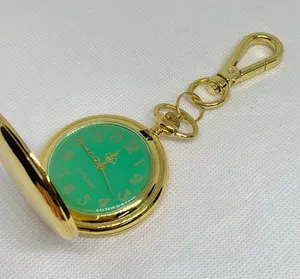 joy & iman Women’s gold tone pocket watch green dial Quartz analog 46mm running thumbnail 1