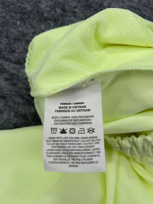 Nike Women's Sportswear Woven Pants in a bright neon green/yellow XS thumbnail 9