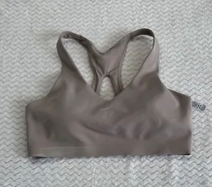 Nike Womens Medium Impact Racerback Sports Bra Taupe Mauve Large RN56323 thumbnail 1