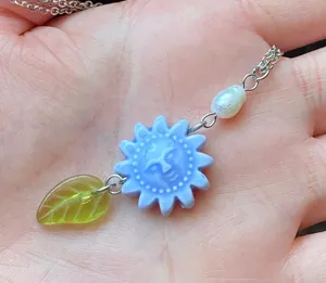 Handmade unique funky cute light blue ceramic sun & Czech glass leaf & freshwater pearl necklace☀️🌿 thumbnail 2