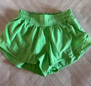 Lululemon Hotty Hot Shorts Low Rise 2.5” Lime Green Women’s Size 2 thumbnail 1