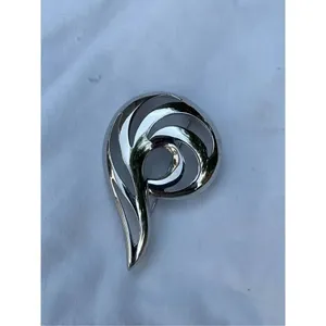 Vintage shiny Monet swirl brooch. Large thumbnail 5