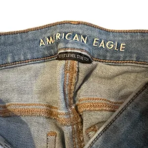American Eagle Hi-Rise Light Wash Distressed Raw Hem Skinny Jegging‎ Jeans Sz 14 thumbnail 6