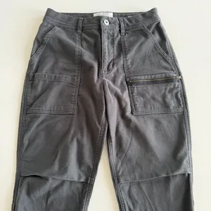 REI - Outdoors Hiking Pants with Zip Pockets and Ankles in Dark Charcoal Gray thumbnail 1