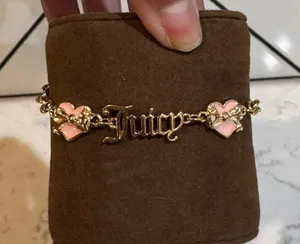 Juicy Couture gold tone bracelet Juicy logo pink heart & bow comes with earrings thumbnail 1