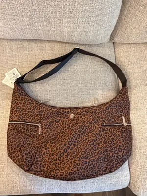 Lululemon Large Slouchy Sling Bag 13L Metal Hardware leopard print NWT thumbnail 5