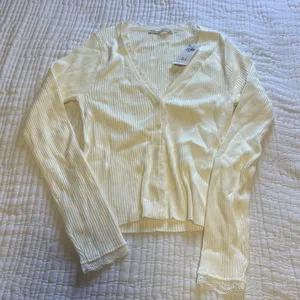 Abercrombie & Fitch lace panel detail ribbed cardigan in cream thumbnail 5