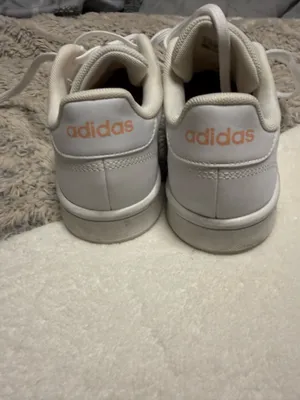 Adidas Advantage Base sneakers in white, featuring iconic perforated three-stripes and a low-profile silhouette. thumbnail 2