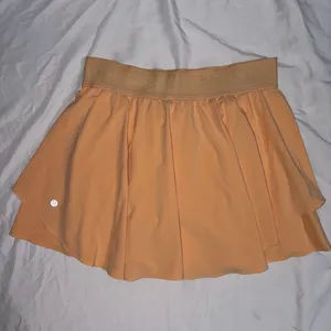 Lululemon Orange court rival skirt long Size 10 thumbnail 2