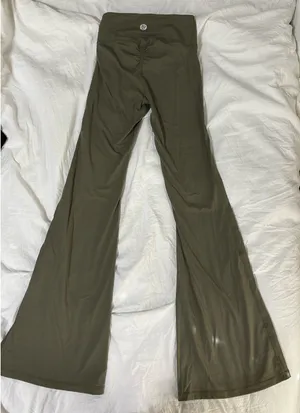 green flared leggings Size XS thumbnail 1