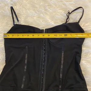 Free People Bodysuit size L color black adjustable stripes please see all photos thumbnail 13