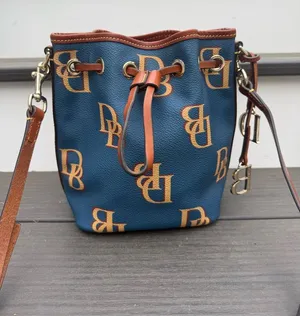Dooney & Bourke Gretta Small Drawstring Crossbody Bag in excellent condition thumbnail 1