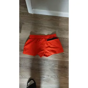 Nike Womens Orange Athletic Shorts With Black Stripe Accents - Lightweight thumbnail 4