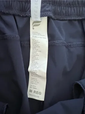 Fabletics Women's All Day Jogger Mid Rise Sweat Wicking Zip Pockets Deep Navy thumbnail 8