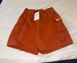 NWT‎ Nike Rust Orange Athletic Cargo Shorts with Swoosh XS thumbnail 1