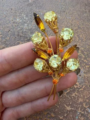 Swarovski Vintage 1960s brooch with gold-tone metal and light green and orange rhinestones arranged in a floral cluster design -no brand stamp thumbnail 1