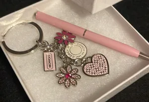 Coach charm & Coach pen thumbnail 1