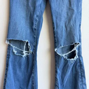 American Eagle Super High Rise Flare Indie Boho Festival Jeans Size 4 thumbnail 2