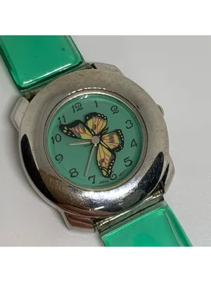 Kids rotating butterfly dial watch two tone 27mm quartz up to 7” running thumbnail 3