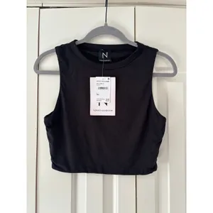 NWT Naked Wardrobe Black Sleeveless Crop Tank Top Women’s Large Stretch thumbnail 2
