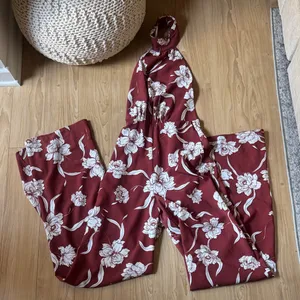 Show Me Your MuMu Floral Jumpsuit in Burgundy and White thumbnail 1