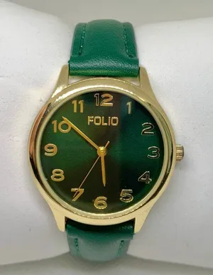 Folio gold tone women’s watch green dial leather band 34mm quartz analog running thumbnail 1