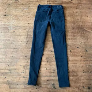 American Eagle size 0 black hi-rise normcore skinny jeans thumbnail 3