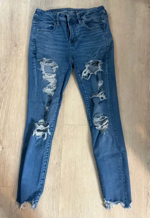 American Eagle Women’s Size 4 Short Next Level Stretch Distressed Ripped Jeans thumbnail 1