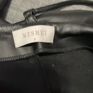 Meshki Zarsa Wide Leg Mid Rise Faux Vegan Leather Pants Going Out Minimalist thumbnail 7