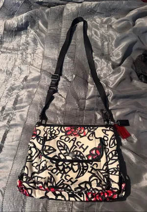 Coach Cream Crossbody Bag with Black Floral Script and Red Accents thumbnail 1