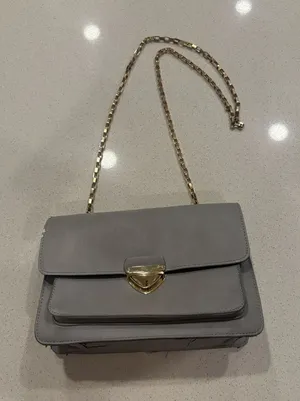 Gray crossbody purse with gold chain strap thumbnail 1