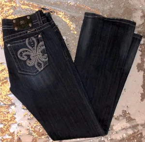 Miss me 30 boot cut, 34 inseam. Signs of wear but still In good condition. thumbnail 1