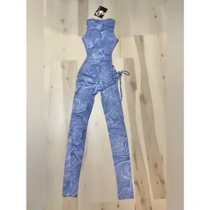 Naked Wardrobe NWT Women Small Blue Marble Mesh No Strings Attached Jumpsuit thumbnail 9