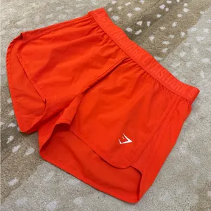 Gymshark orange elastic waist athletic shorts women’s size XL thumbnail 3