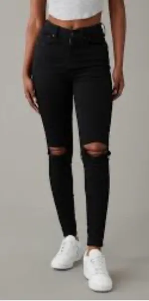 American Eagle Outfitters black distressed mid rise jegging size 8. thumbnail 1