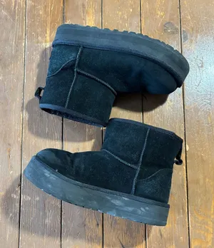 UGG Classic Mini Platform boots booties featuring thick soles and suede uppers. thumbnail 1