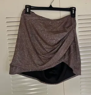 House of CB London "Shaker" Sparkle Draped Mini Skirt. Metallic, glittery, bronze finish with a ruched draping #houseofcb #miniskirt #highend #fashion thumbnail 1