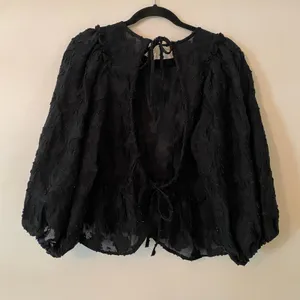 Free People Black Textured Sheer Flowy Blouse Open-Back Women's size Large thumbnail 6