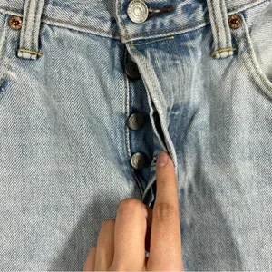 Levi’s Light‎ Wash 501 High Rise Distressed Jeans thumbnail 2