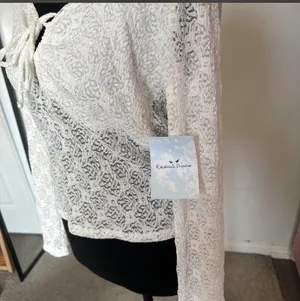White lace blouse with floral pattern and tie front detail thumbnail 2