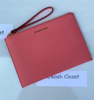 MK JST XL Zip Wristlet Clutch - Grapefruit thumbnail 1