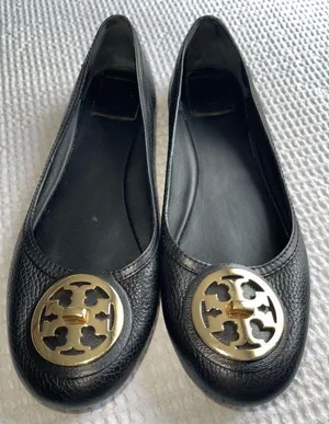 Tory Burch Black Flats with Gold Emblem thumbnail 1