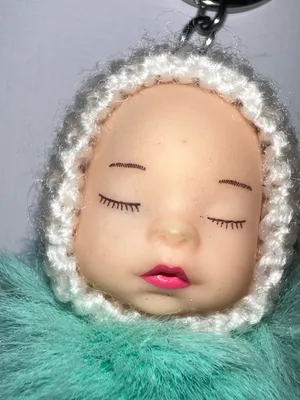 Baby doll puff ball keychain. thumbnail 2