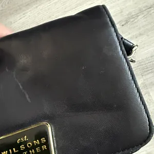 Wilsons Leather Black Mini Bag with Gold Plaque thumbnail 2
