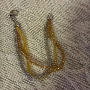 Elegant Gold and Silver Braided Bracelet thumbnail 2