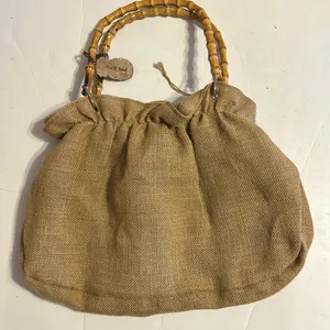 Tan purse made from burlap with beige flower and bamboo handles thumbnail 2