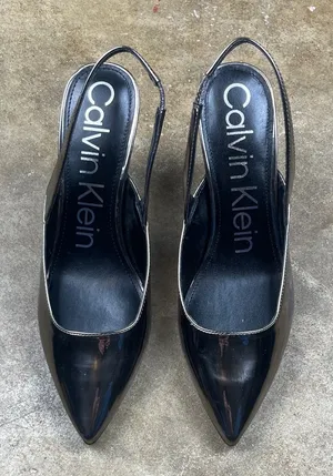 Calvin Klein Metallic Slingback Heels
Size: 9 thumbnail 1